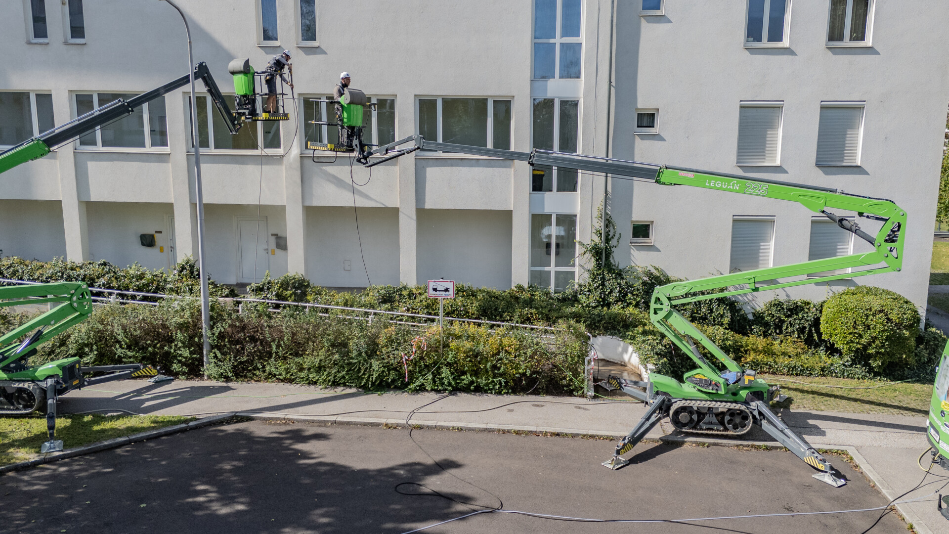 Fleet of 16 Leguan Spider Lifts Helps Algenmax Keep Facades Clean